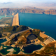 In this photo taken on Nov. 18, 2005, Pakistan's biggest Tarbela Dam is observed from an army helicopter in Tarbela, Pakistan. Floods in Pakistan in summer of 2010 have reopened a quarter-century-old debate on whether to build a large hydroelectric dam on the River Indus, a dispute that has split the nation along regional lines. Supporters say the water reservoir could have prevented much of the floods' devastation and boosted agricultural production along the river. Opponents say just the opposite.
